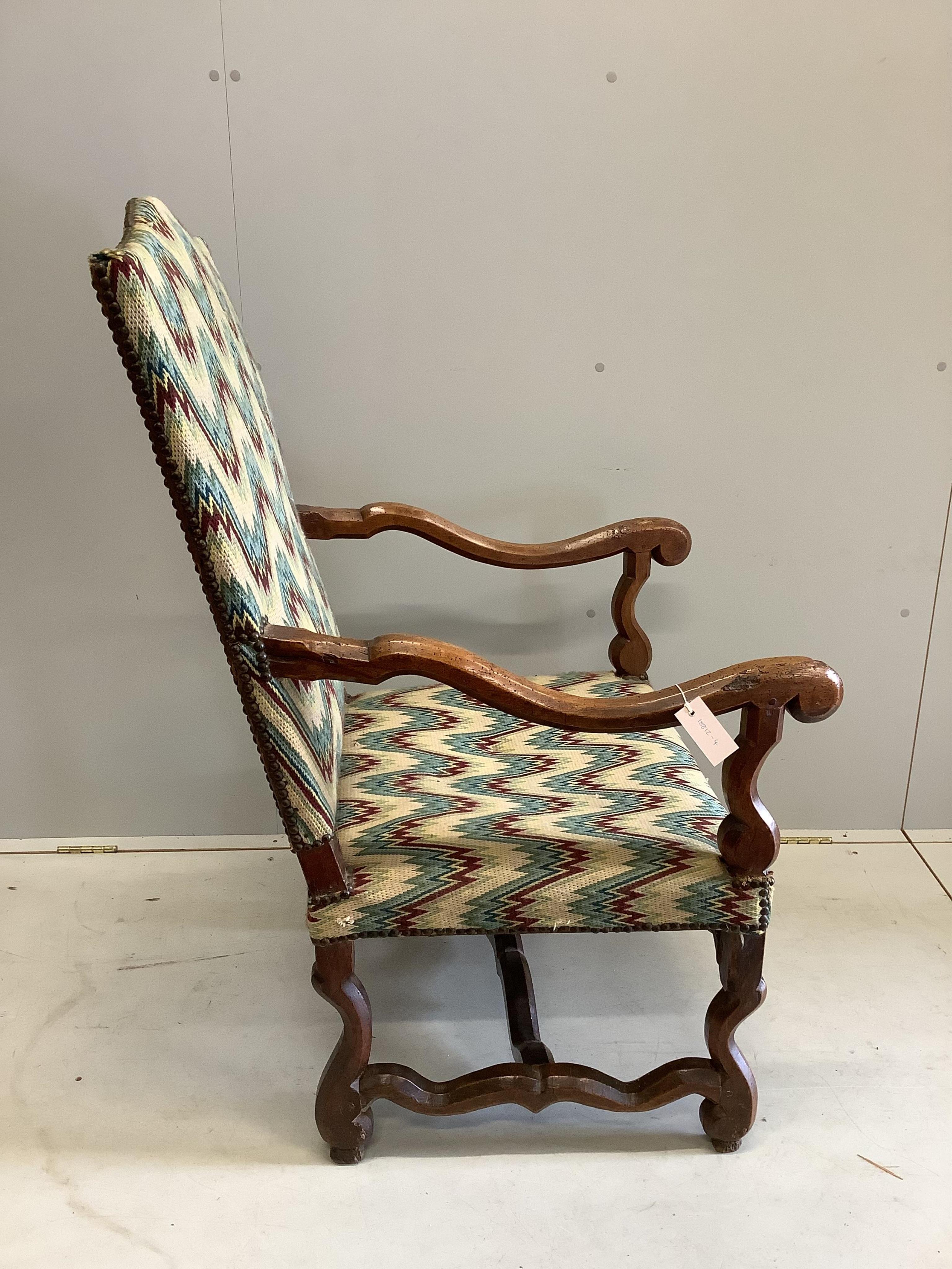 A 19th century French walnut armchair, in the 17th century style, width 64cm, height 116cm. Condition - heavily wormed, frame wobbling